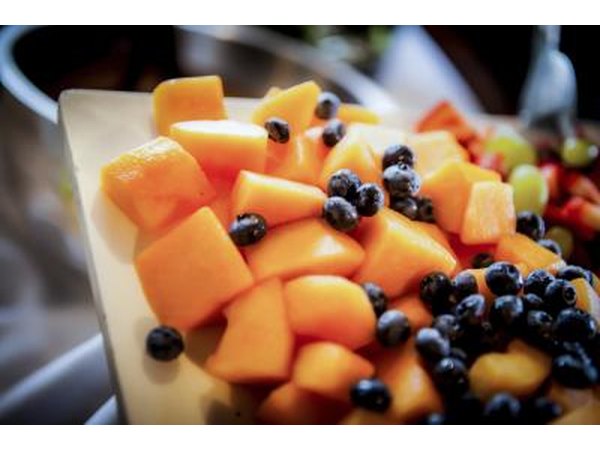 Canteloupes as part of a fruit platter.