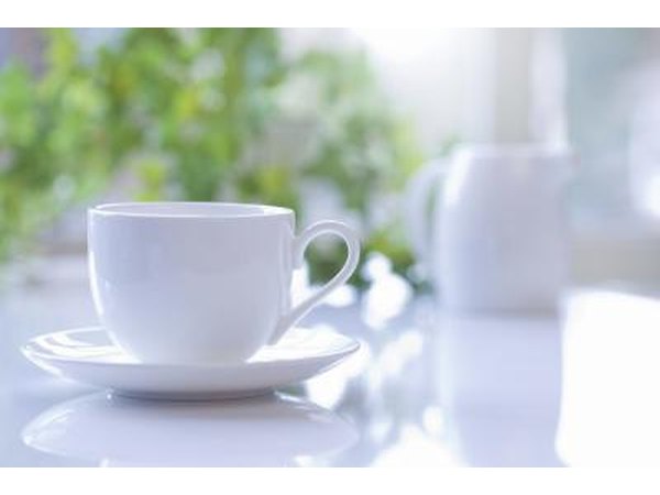 Coffee cup on table.