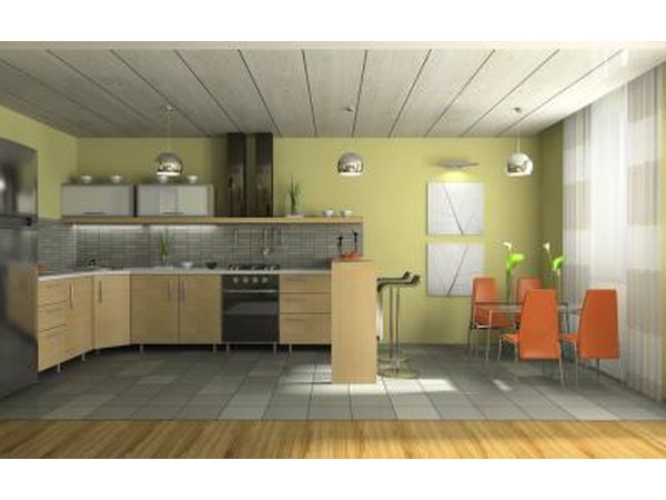 Tones of green often work well in a kitchen with oak cabinetry or a room with oak floor and trim