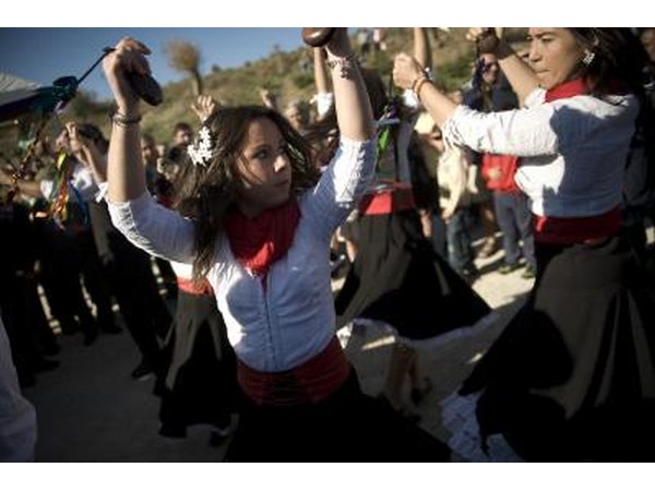 A girl playing castanets.