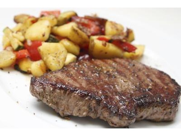 Barbecue with meat and potatoes