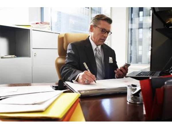 Businessman sitting behind desk