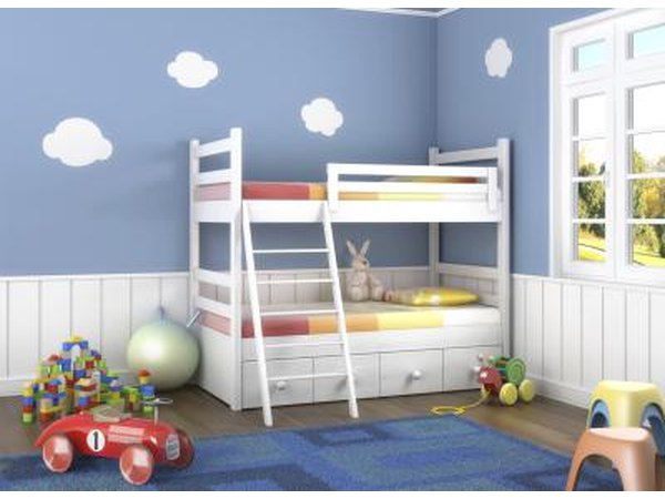 Kid's bedroom with large furniture against wall.