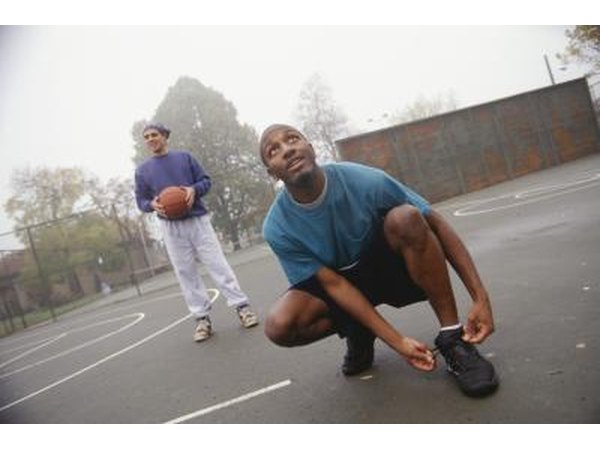 Man tying shoe
