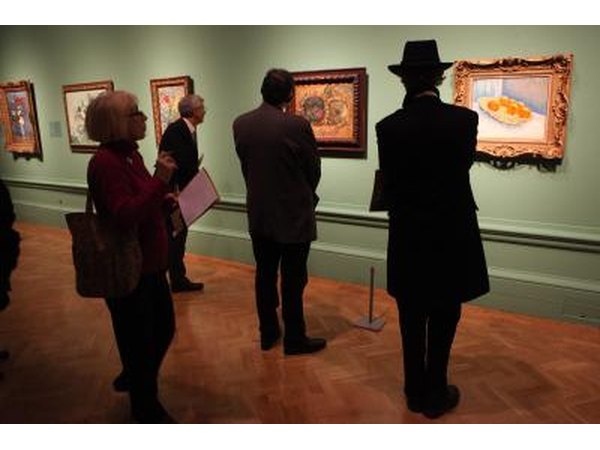 People viewing artwork done by Dutch master Vincent Van Gogh