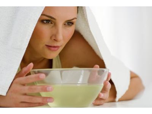 Woman inhaling steam