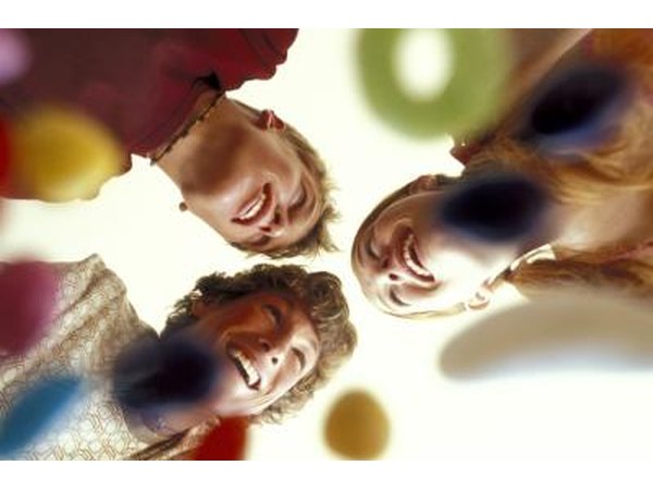 Friends playing game at party