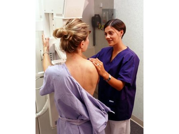 Nurse with patient in mamogram
