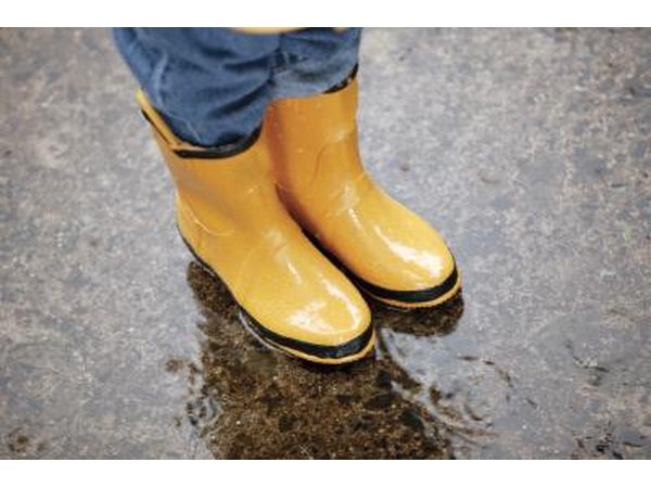 Boots in rain puddle.