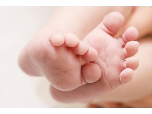 Put a close-up of baby's tiny feet on the cake.