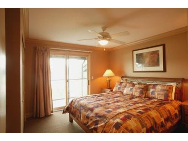 Bedroom with burnt umber walls.