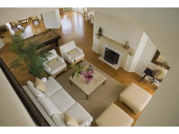 A bird's eye view of a living space from a loft above.