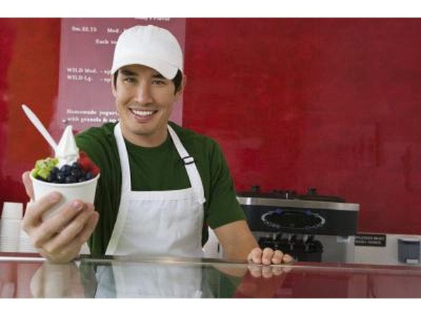 man handing over ice cream