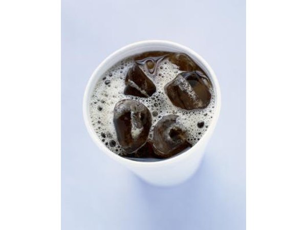 A cup with cola and ice.