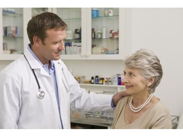 older woman speaking with doctor