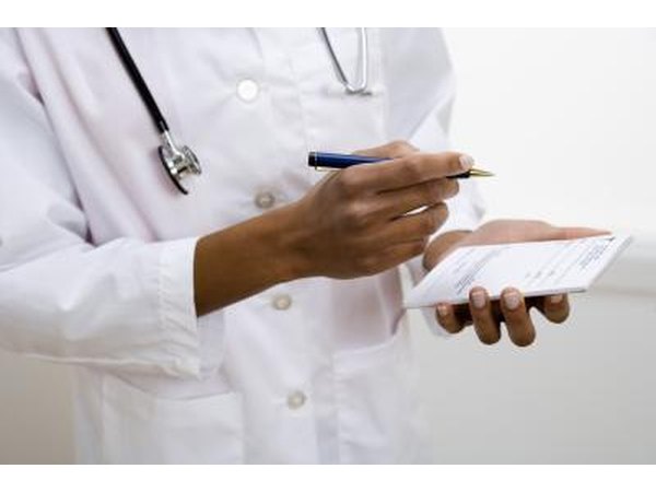 Doctor writing prescription