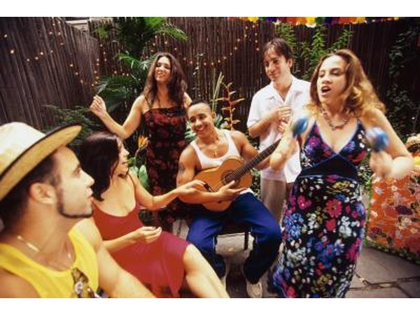 Woman playing maracas in party band