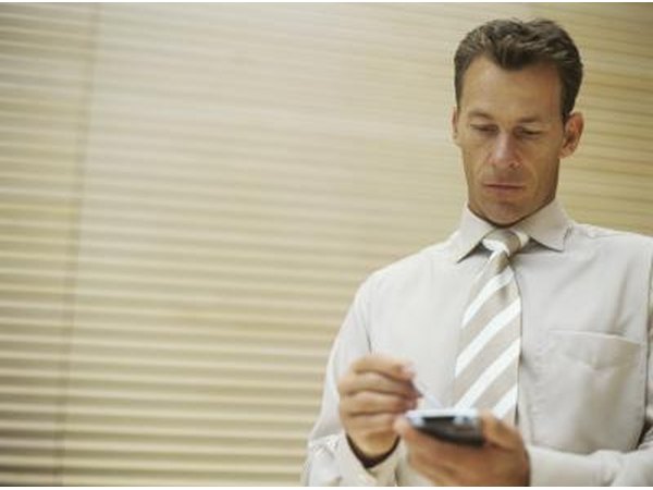 Man writing on tablet