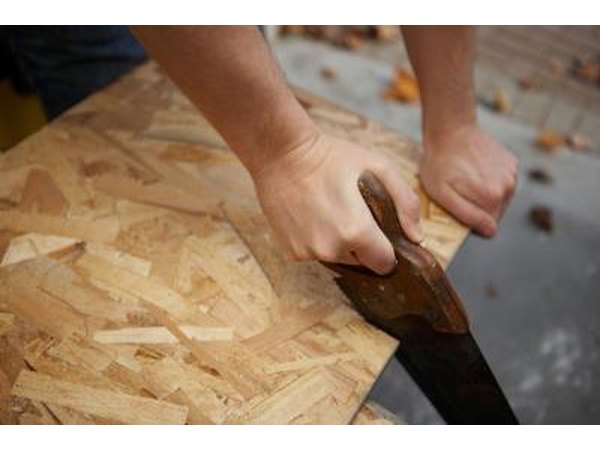 Man sawing wood