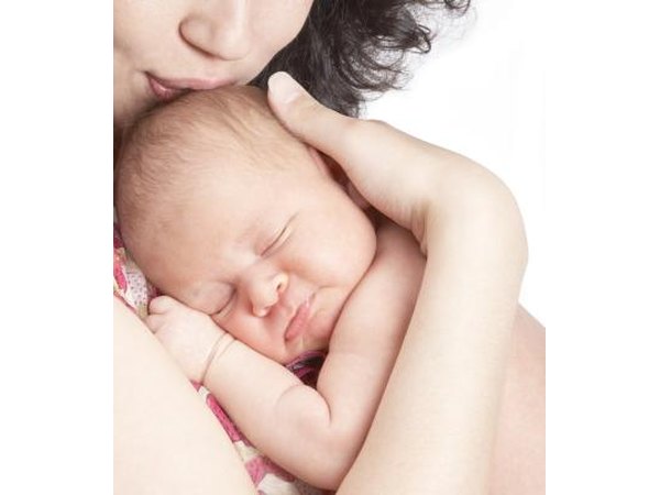 A mother holding her infant