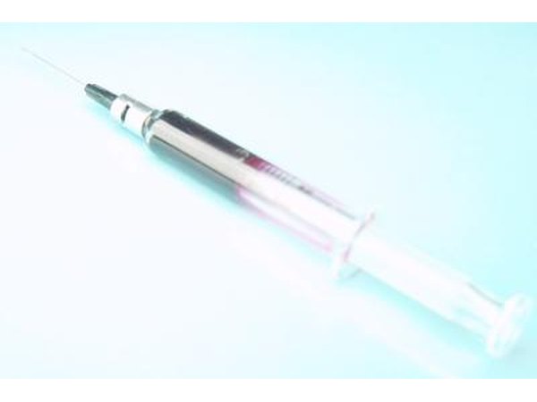 Hydrodermic syringe.
