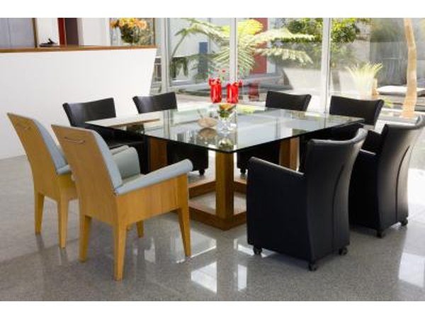 A modern dining room table with seating for eight.