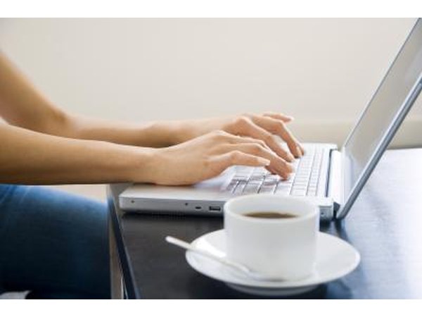 Woman doing research on laptop