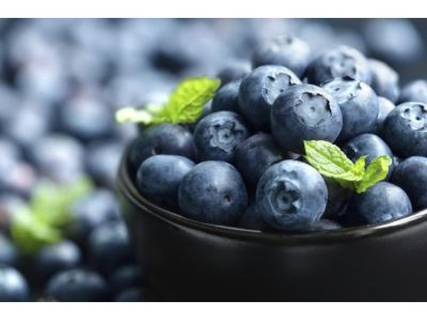 Small bowl filled with blueberries.