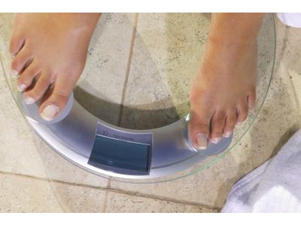 woman's feet on scale
