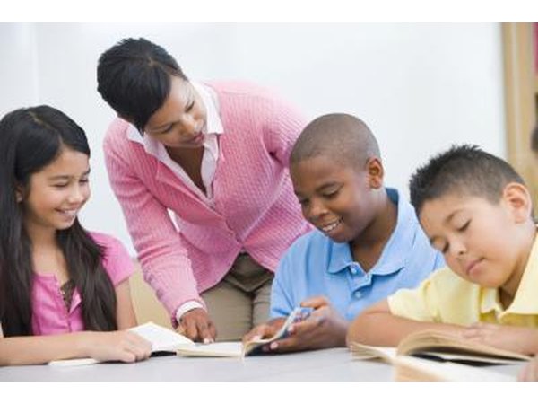 Assistant teachers aid children with lessons and work in the classroom.