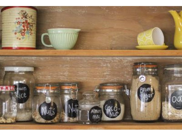 A shelf of labeled mason jars.