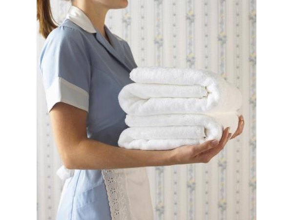 Hotel maid and towels