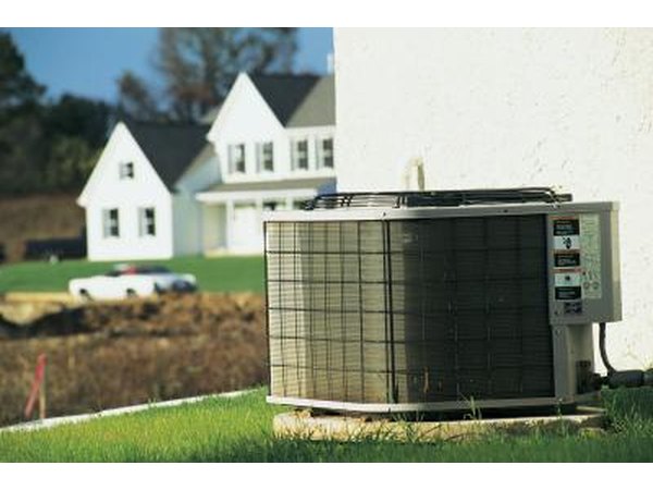 Place a tree near the air-conditioning unit to provide cooler air for the intake.