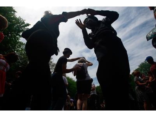 People swing dancing outdoors
