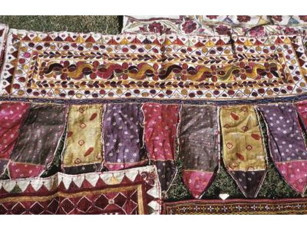 A quilt is sewn from the patches to keep the baby warm and protected at night.