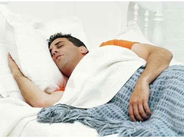 A man sleeping in bed