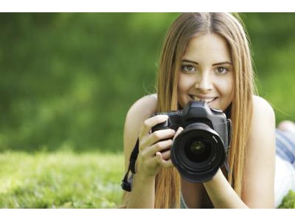 Woman holding a digital camera