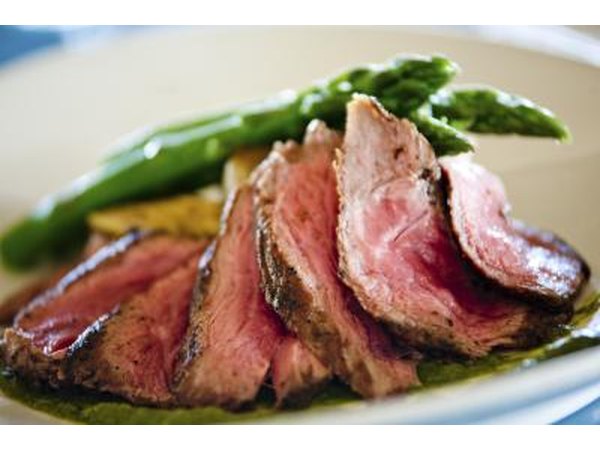 Mushroom encrusted sirloin on a plate.