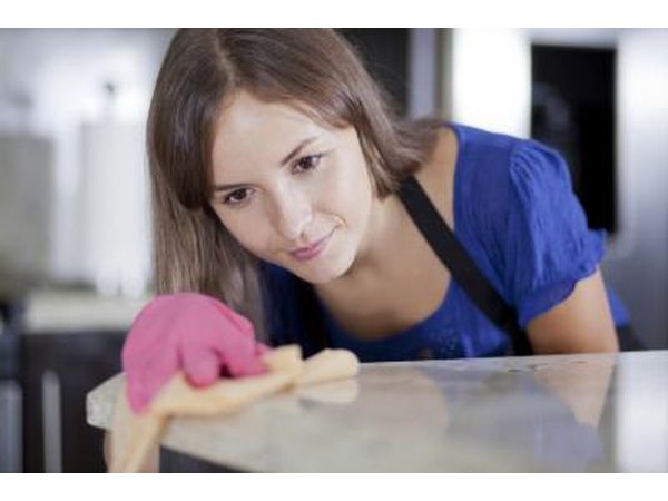 Woman cleaning counters