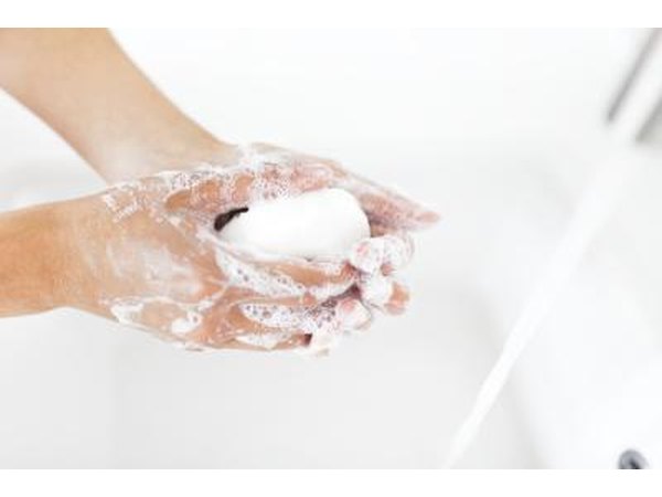 Woman washing her hands