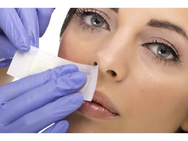 Woman at dermatologist.