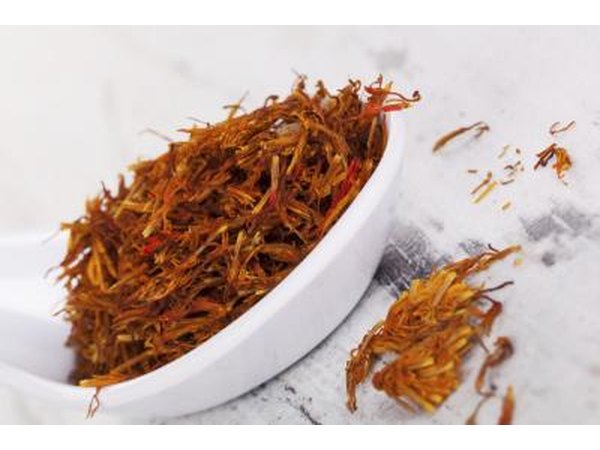 Saffron on a white spoon.