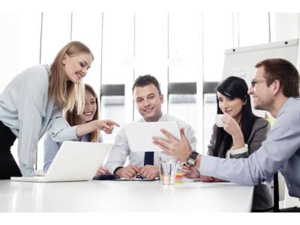 An advertising project manager crafts advertising strategies and presents them to clients.