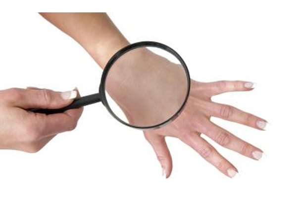 Use magnifying glass to look for debris.