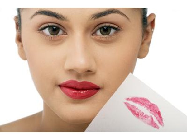 woman with lipstick mark on paper