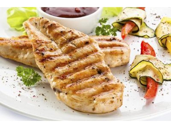 Grilled chicken on a plate with vegetables