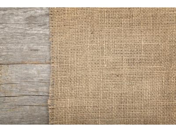 Burlap material on a wood surface.