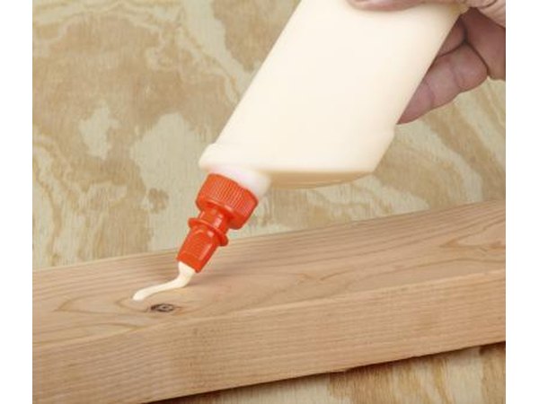 Glue being applied to a piece of wood