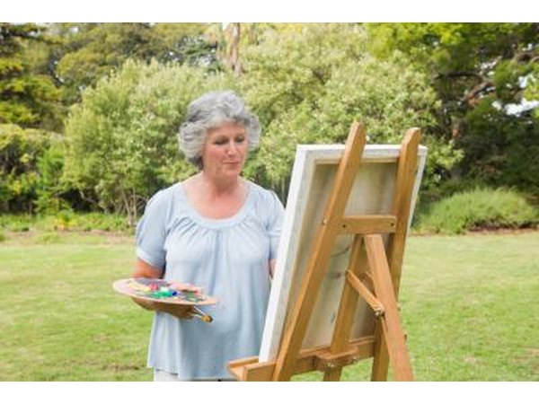 Painting a canvas.