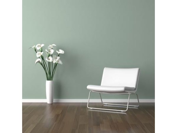 A muddy green wall color will help mellow red oak cabinetry